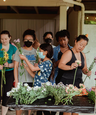 Group of woman in a flower workshop