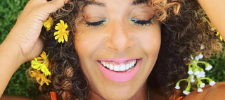 Woman with little yellow flowers in her hair